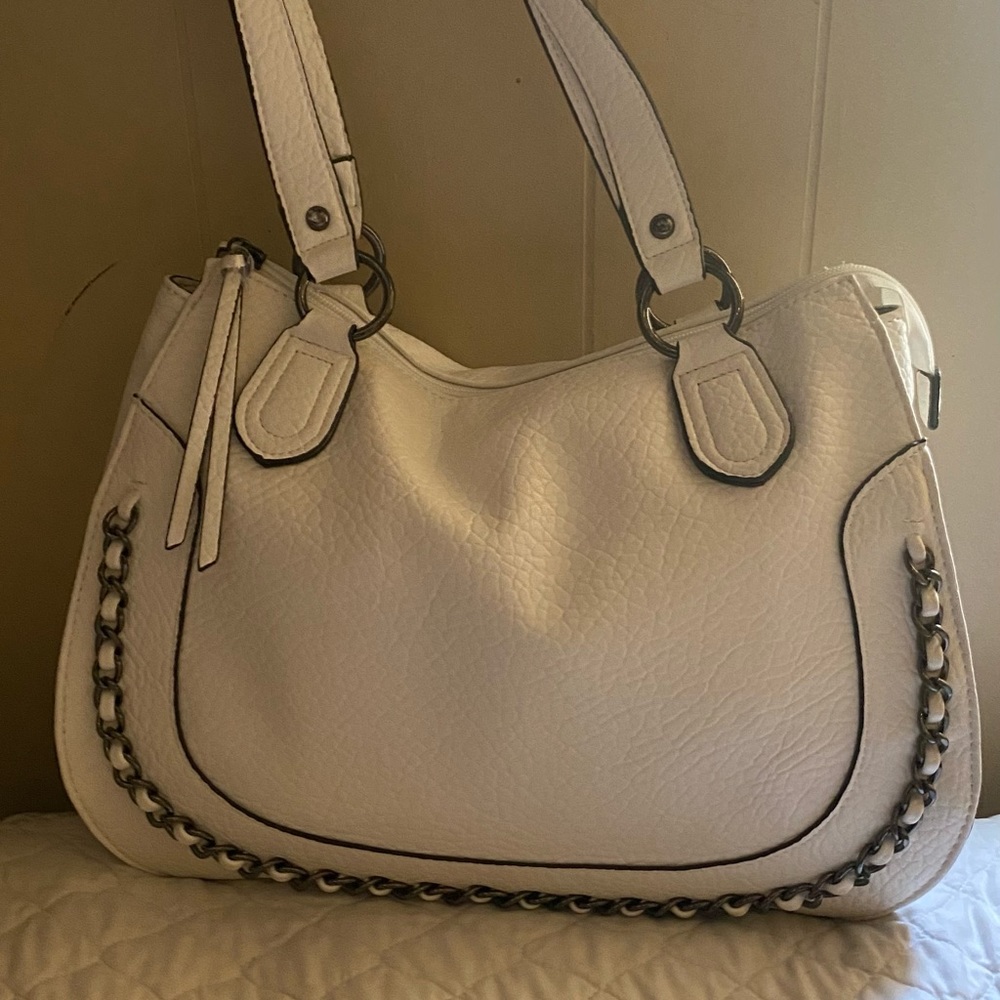A beautiful new white bag, it is medium to large and very comfortable